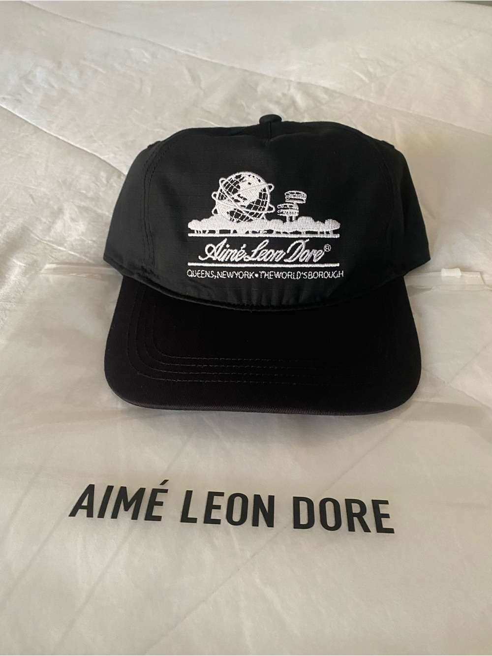 FW23 Aime Leon Dore Unisphere Hat in Jet Black & white